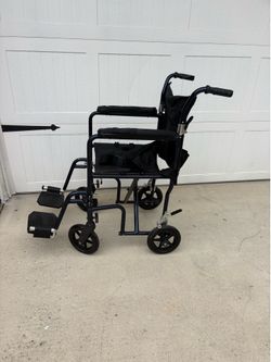 Transport wheelchair