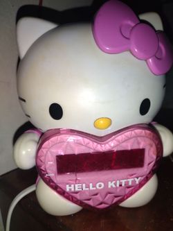 I have this very nice Hello Kitty clock radio I think I have an alarm on it works perfect AM FM