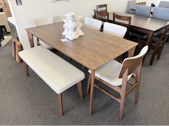 Dining table with 4 chairs and a bench