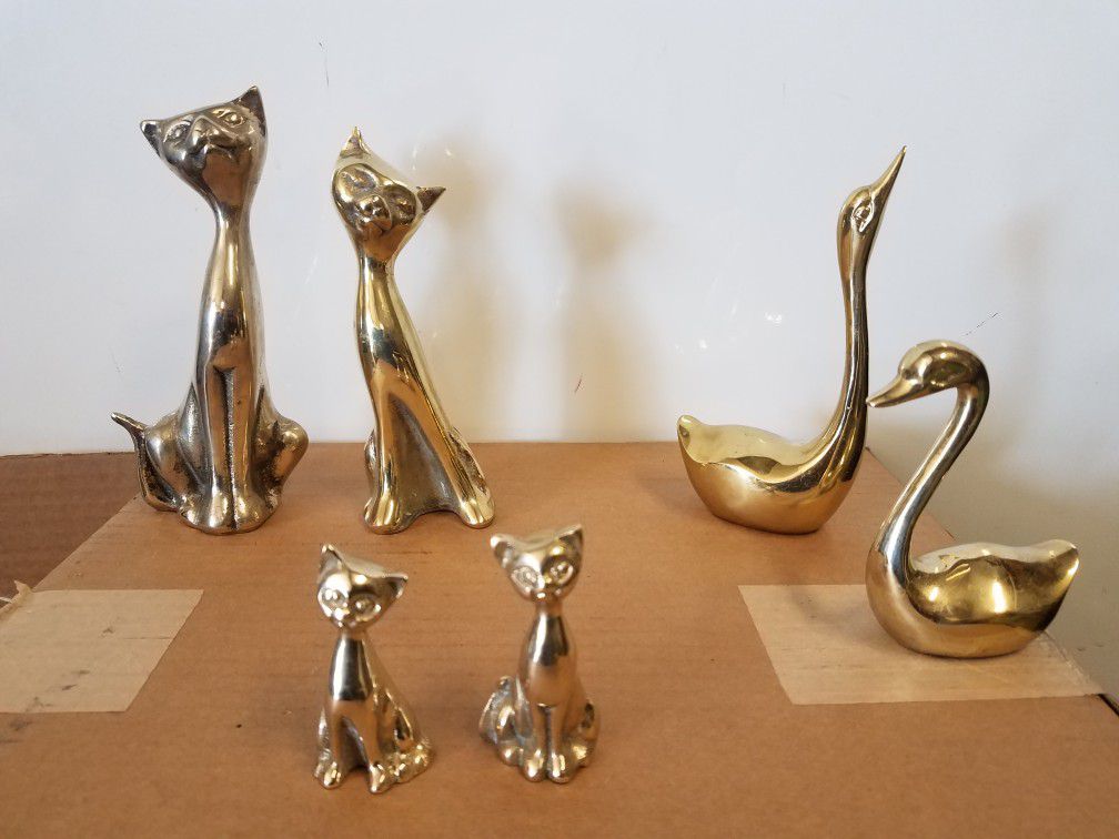 Brass figurines- cats are sold