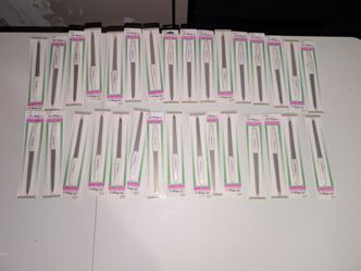 Selling Nail Touch Professional Sapphire Nail Files for $3 each and Glue on Nails