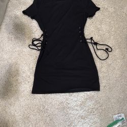 Elegant Black Lace-Up Dress shirt side tie sexy small says xs but not short sleeve. New no tags came in a bag. Ordered 2 on accident