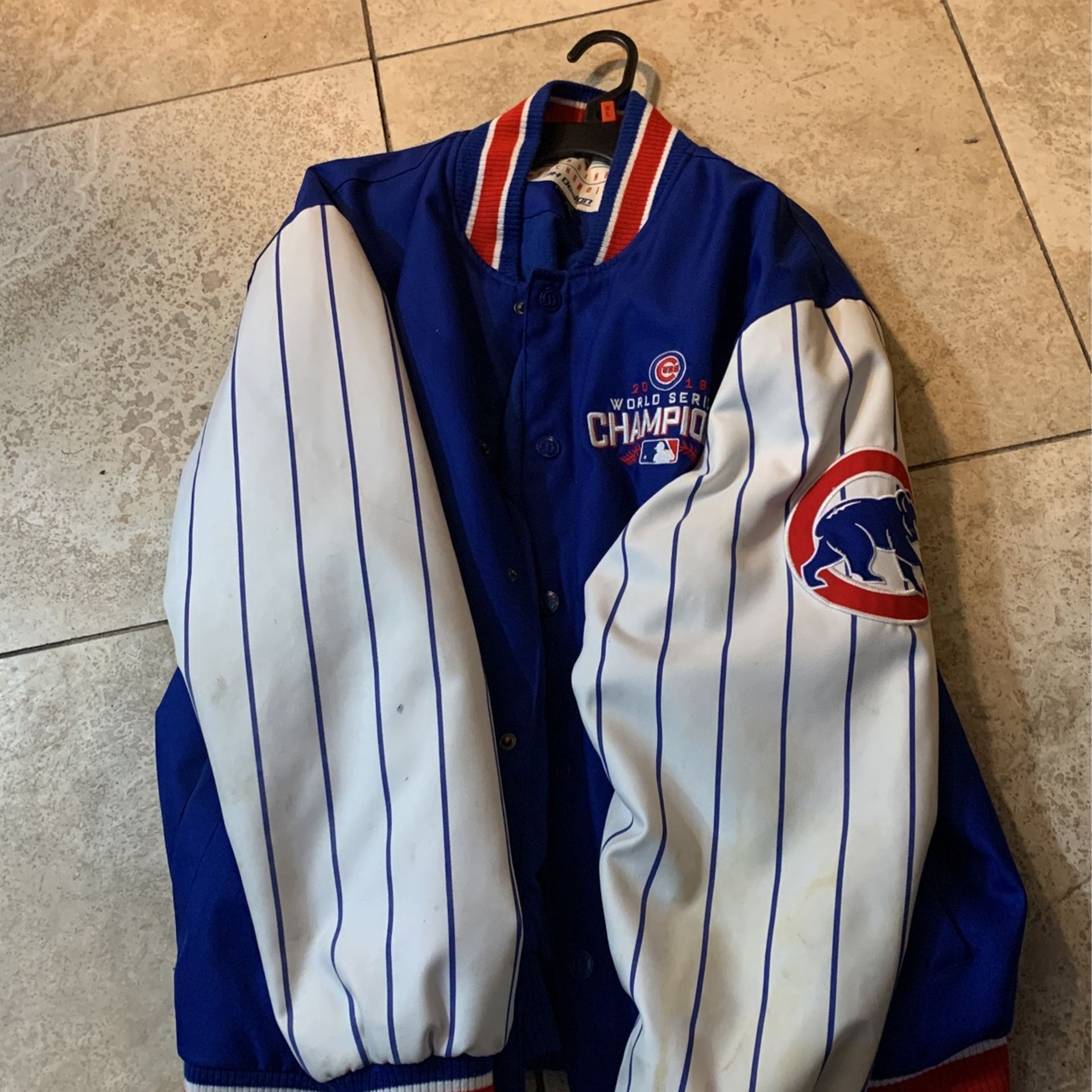 Brand new authentic Chicago cubs jackets retail price is $500 I am only asking for 275 or best offer willing to negotiate size extra large