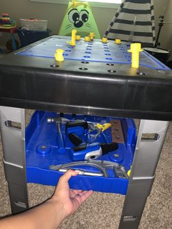 Tool table and little tiles kitchen