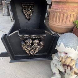 Gothic Victorian Cherub baby cradle. Used to be used for babies in the early 1900’s