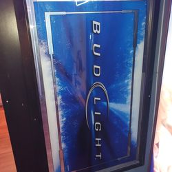 PRETTY BIG SIZE BUD LIGHT MIROR...AS IN PICTURES..AVAILABLE FOR FAIR OFFERS.. PICK UP VICTORVILLE..