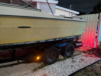 Need gone ASAP TRAILER WITH FREE 20Ft SeaRay good hull