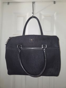 Authentic Etienne Aigner handbag from the "All Aboard" collection.