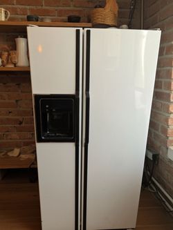 White Side-by-Side Refrigerator with Ice Dispenser