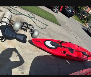 12 foot kayak with paddles and seat and roller