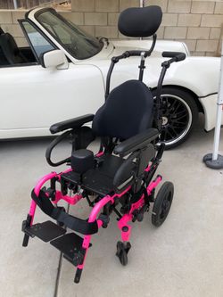 Zippie iris pink folding tilt pediatric chair