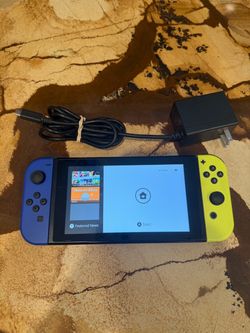 Nintendo Switch with Blue and Yellow Joy-Cons