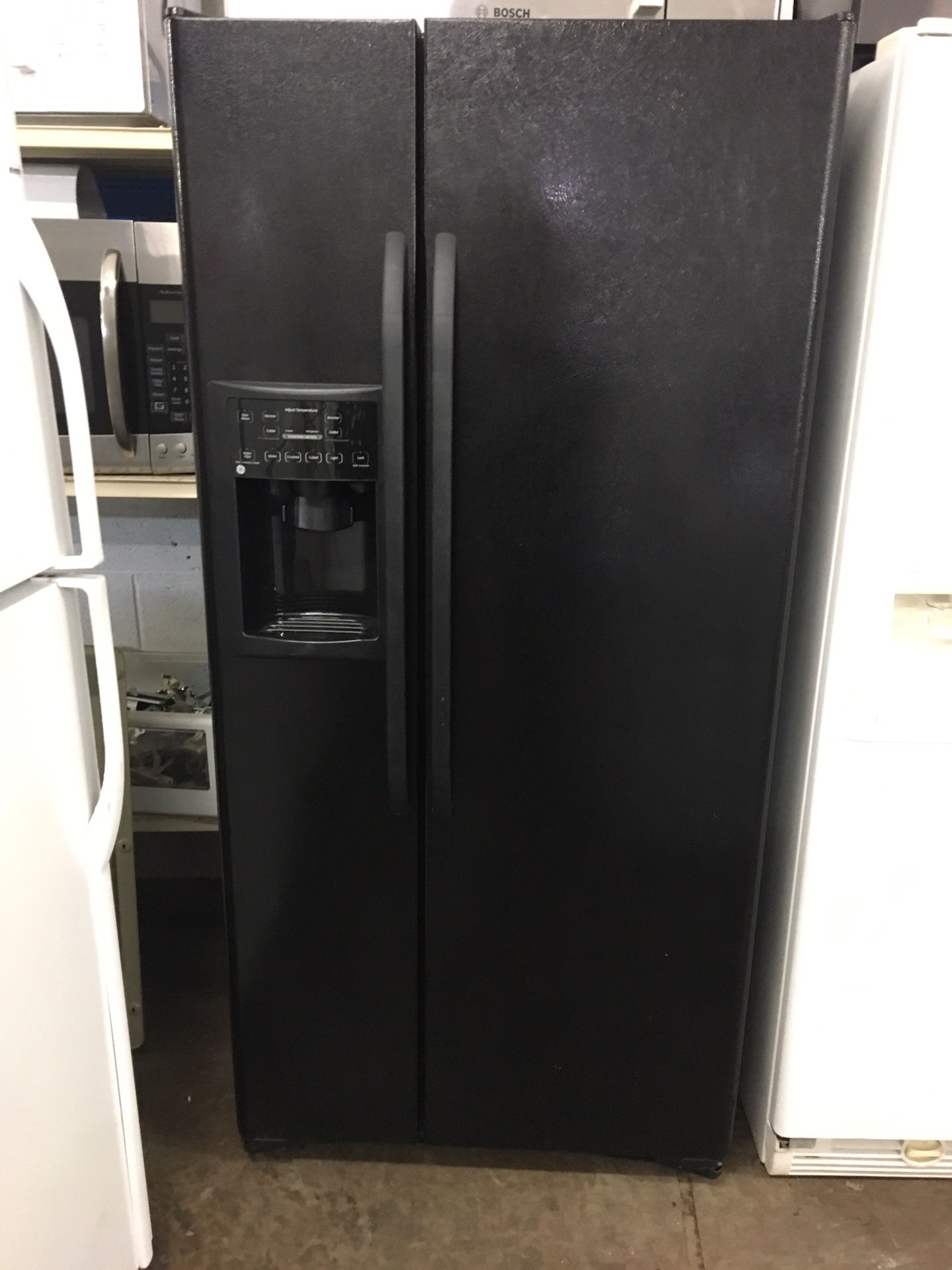 Financing - 90 Day Warranty - Guaranteed Refurbished Black side-by-side refrigerator water and ice dispenser