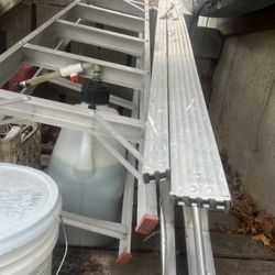 Two Six Foot Aluminum Ladders