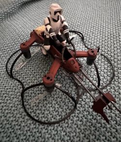 Propel Star Wars 74-Z Speeder Bike Battling Drone