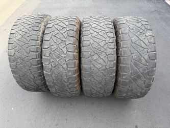 (4) 285/70R17 Nitto Ridge Grappler Tires