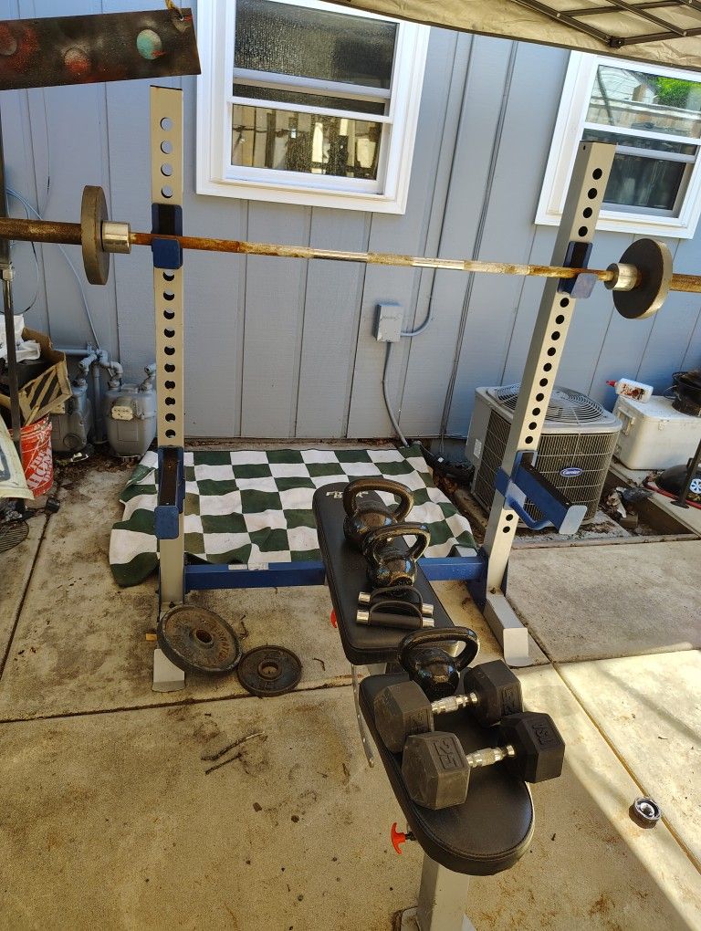 Bench Press W Olympic Bar And Some Weights