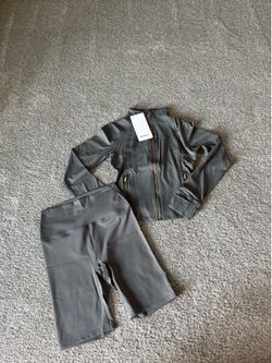 gray lululemon with gold zipper  size 6