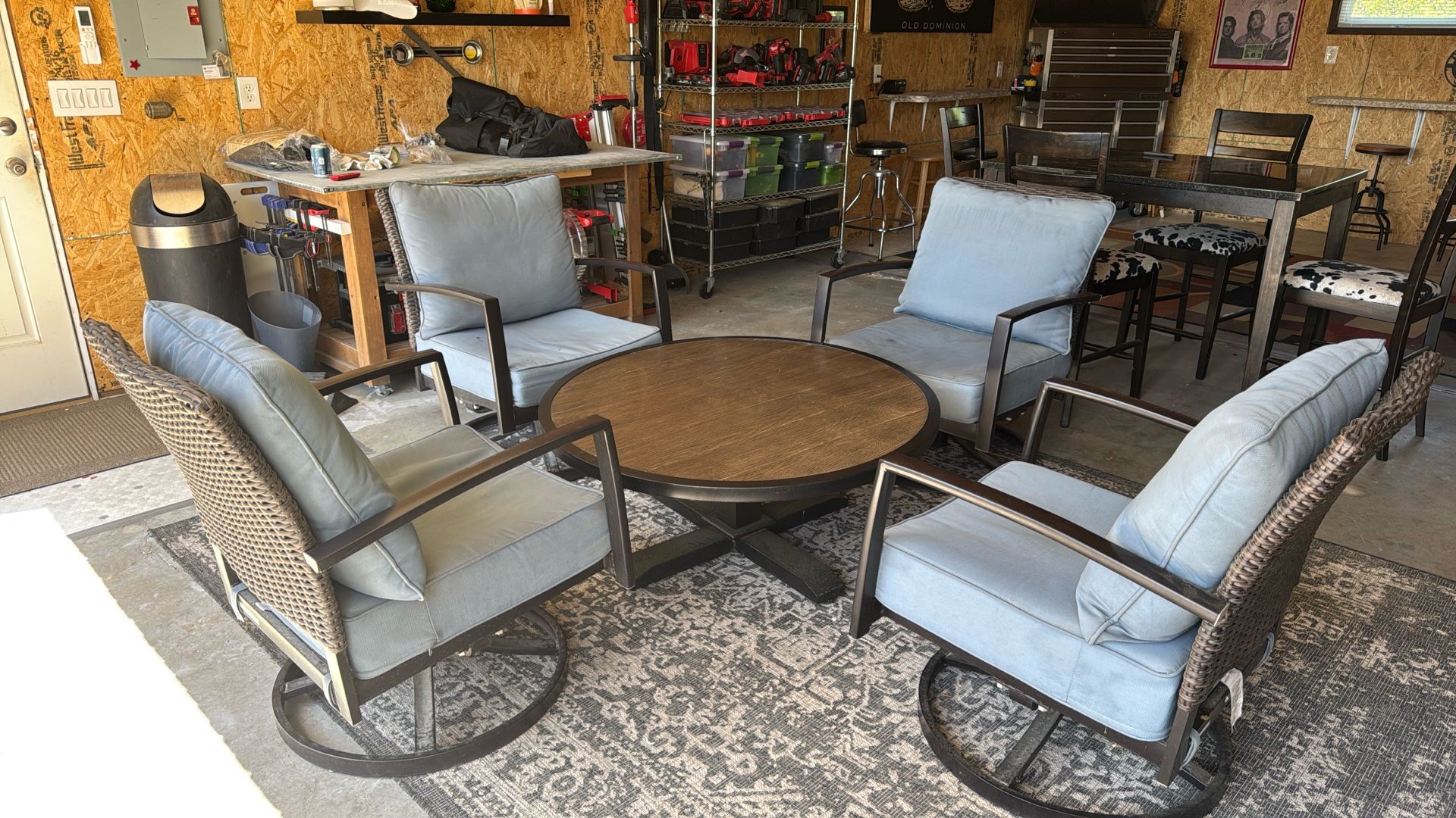 Outdoor Table And 4 Swivel Rocker Chairs