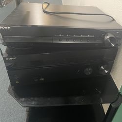 Tv stand 55-60” , 5 cd changer, AM, FM Radio, multiple Sony AV stations