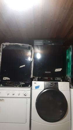 Stainless , black, and white dishwashers