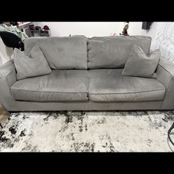 Grey Loveseat And Ottoman  Ashely Brand