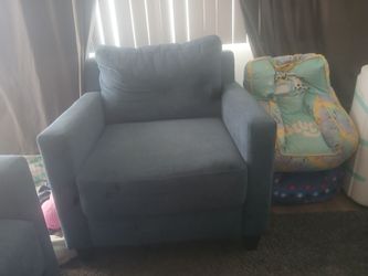 Blue couch with single seat