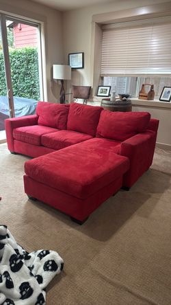 Red fabric coach with movable footrest part