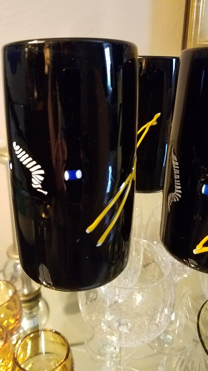 Four signed hand blown glasses