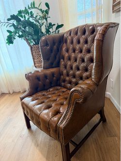 Wingback chesterfield armchair