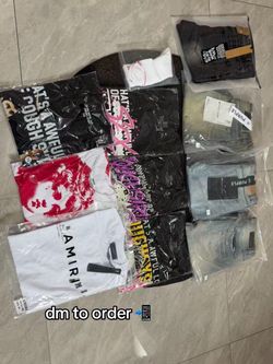 Brand new thats awful shirts and some purple jeans