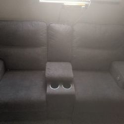 Ashley Furniture Dual Power Reclining Couch And Loveseat With Consule 