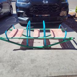 Kids rocking seesaw