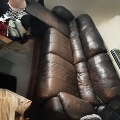 Sectional reclining sofa