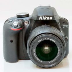 Nikon D3100 DSLR Camera with 18-55mm f/3.5-5.6 Auto Focus-S Nikkor Zoom Lens