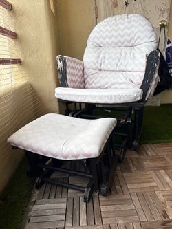 Free rocking chair with foot rest
