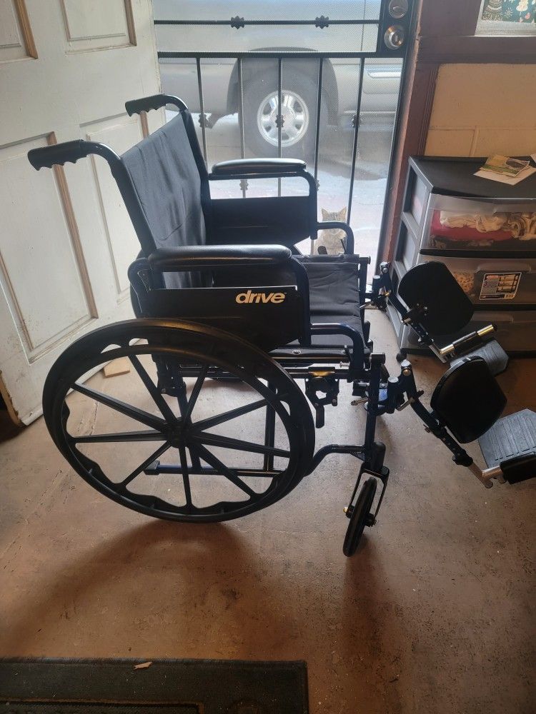 Blue Streak Wheelchair With Elivating Leg Rests 20" Weight Capacity 250 Pounds