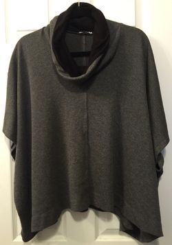 Three dots cape style top