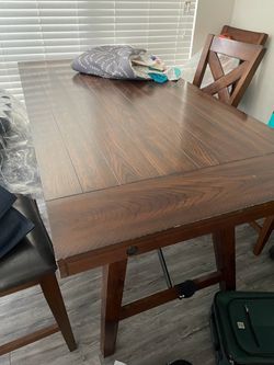 Solid wood dinner table and 6 chairs