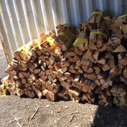 Bundles of dry-seasoned firewood   (Ask about delivery)