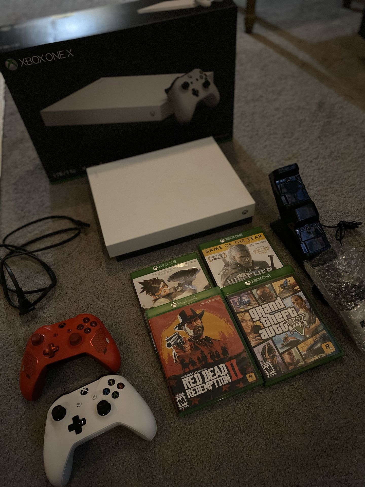 Xbox one x 1tb 2 controllers 3 games and accessories original box
