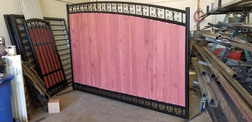 Custom steel gates with integrated rustic wooden planks any size and all styles