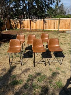 Brown leather barstools