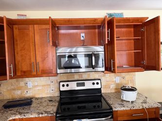 Kitchen and Bathroom wood cabinets.
