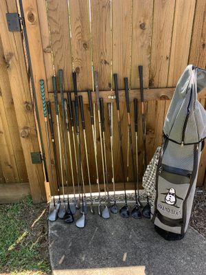 Photo Grand slam penguin golf bag, 17 assorted clubs and three covers