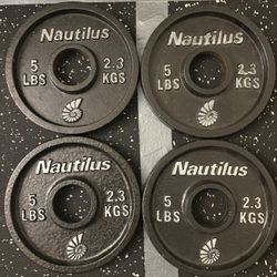 Four 5lb Olympic Plates 