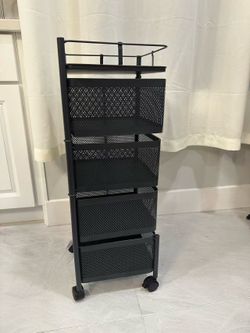 New in box! 4-tier Rotating Storage Rack, No Assembly Required. 31*10.5*10.5 inch. Rack with Wheels, Black