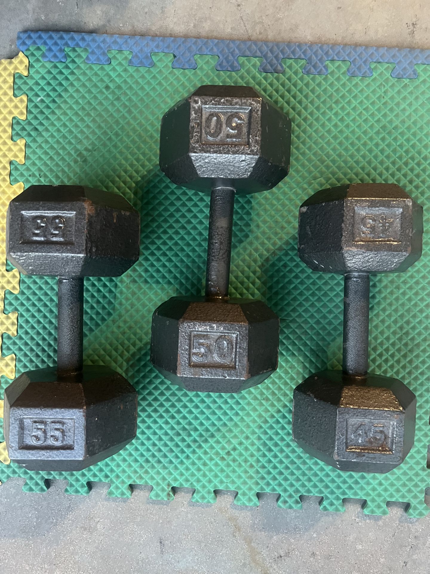 Single 45LB, 50LB, 55LB dumbbells