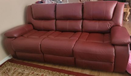 Leather reclining sofa and love seat