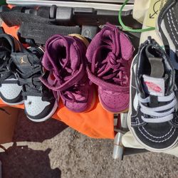 Infants size 4 orange Nike$60 ,size 4 infant purple $60  size 3 infant vans black & white $40 .